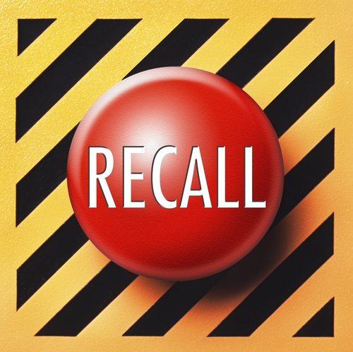 Recall button in red with white letters on a yellow and black background