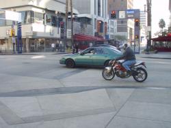 Rider on a motorbike in Los Angeles, CA. Rising Gas Prices Means More Motorcycle Accidents