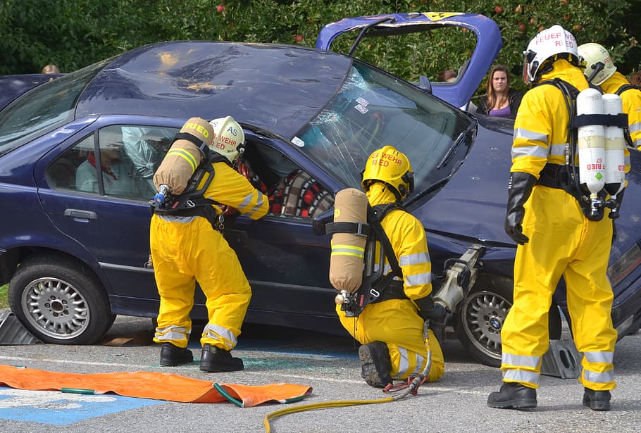 Fantasy image of fire department loosing trapped car accident victim off Olympic Boulevard in West Los Angeles