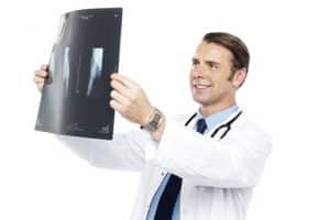 Doctor reading an Xray