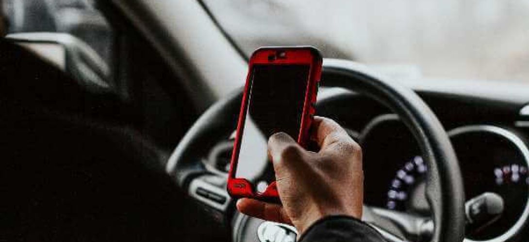 Distracted driver using a smartphone