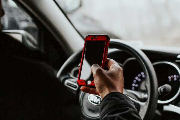 Distracted driving has become an 'epidemic,' new report suggests