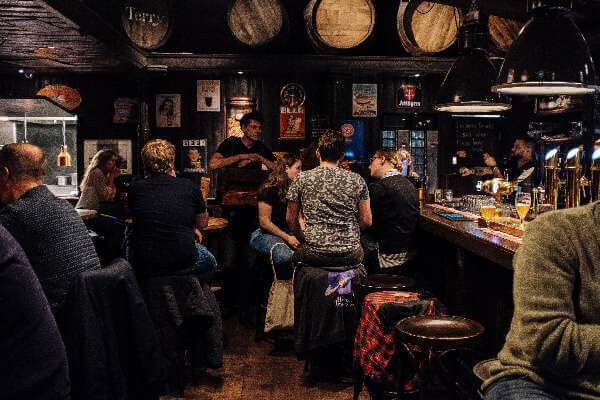 Dramshop lawsuit attorneys enjoying beers at an Irish Pub