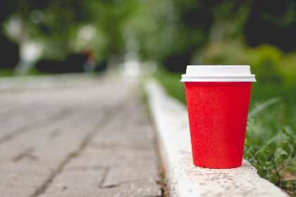 Red Coffee Cup. Plastic Consumption and Cancer